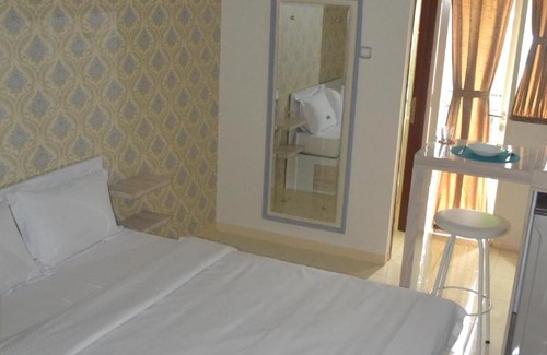 South Tangerang Hotel | Green lake view apartement - ciputat