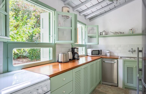 Skopelos House | Green setting with swimming pool in the heart of the village, ideal for families