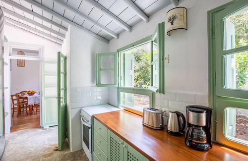 Skopelos House | Green setting with swimming pool in the heart of the village, ideal for families
