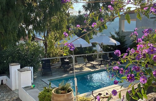 Skopelos House | Green setting with swimming pool in the heart of the village, ideal for families