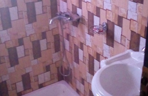 Ashanti Region House | Green Square Guest House is a house with eight private bedrooms each with its.