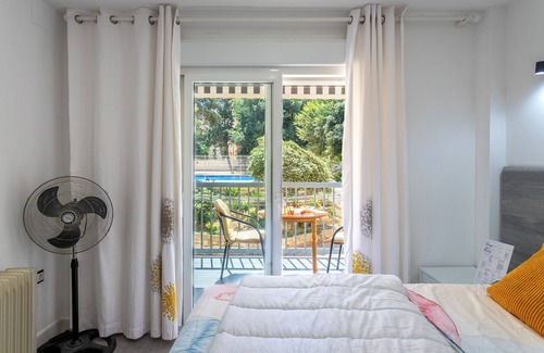 Rincon de Loix Apartment | Green Tree Suite with nice garden and pool balcony views in Benidorm