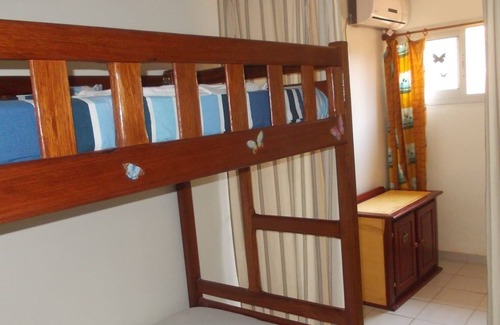 Kribi Apartment | Ground floor apartment 1 family room for 4