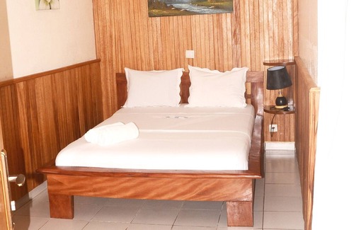 Kribi Apartment | Ground floor apartment 1 family room for 4