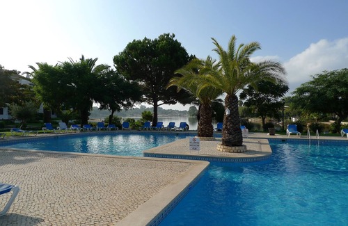 Almancil Apartment | Ground Floor Apartment in Lakeside Village overlooking lake, pool and gardens.