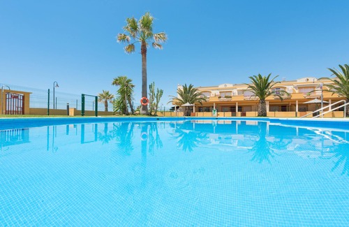Bolonia Apartment | Ground floor beachfront, shared pool