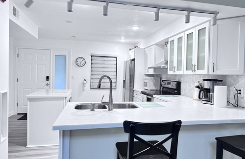 Cocoa Beach Condo | Ground Floor Open Modern, Architecturally Redesigned Just Steps from the Beach.