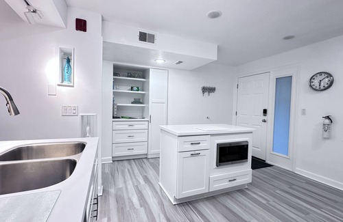 Cocoa Beach Condo | Ground Floor Open Modern, Architecturally Redesigned Just Steps from the Beach.