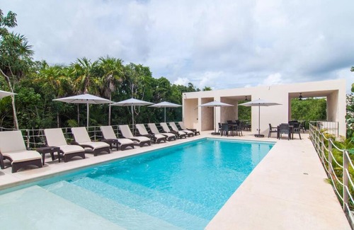 Akumal Apartment | Ground level Garden condo at Akumal south by TAO Santamar