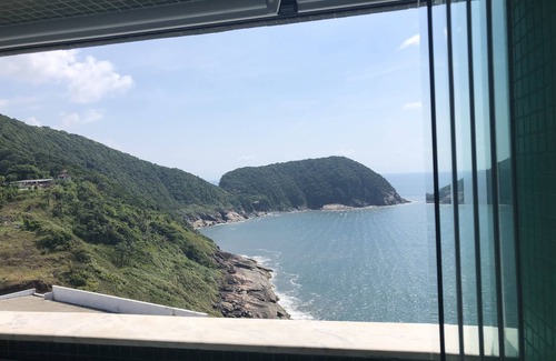 Peninsula Apartment | Guaruja: A Lookout to the Open Sea, seeing Ilhabela and Alcatrazes.
