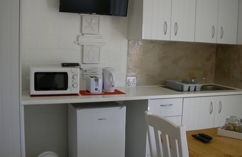 Stompneusbaai Apartment | Guest Suite with a sea view