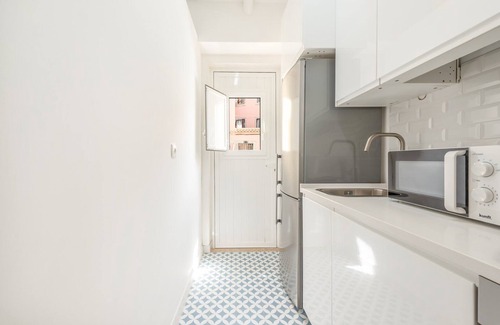 Restelo Apartment | GuestReady - Neoclassical building - Studio CVD