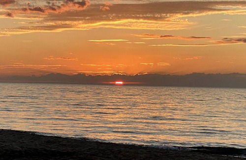 Shorewood-Tower Hills-Harbert Cottage | Guests have access to 200 ft of private beach & sand dunes on Lake Michigan.