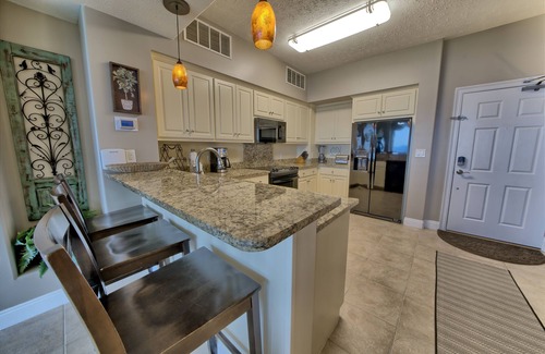 Thomas Drive Condo | Gulf Crest 2BR all tiled gulf front condo! Beach Chair Service included!