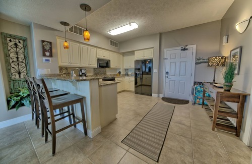 Thomas Drive Condo | Gulf Crest 2BR all tiled gulf front condo! Beach Chair Service included!