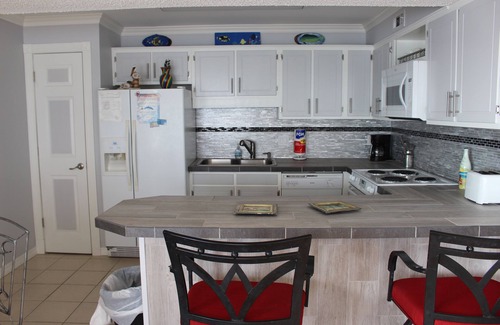Fort Walton Beach Condo | Gulf Front, Top Floor End Unit with Front & Side View of Gulf