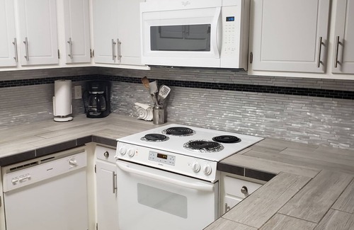 Fort Walton Beach Condo | Gulf Front, Top Floor End Unit with Front & Side View of Gulf