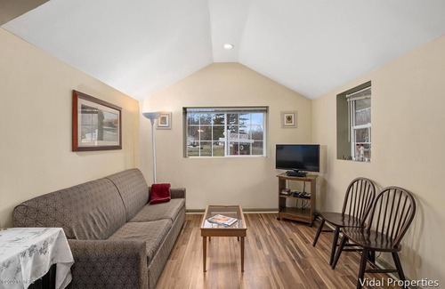 Shelbyville Cottage | Gun Lake Vacation Rental, Sandy beach, docks, picnic tables, kids play grounds