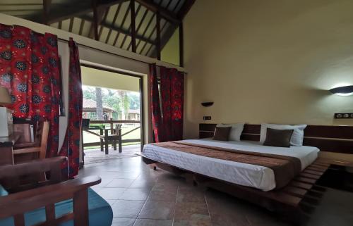 Kinindo Hotel | Hôtel de la Palmeraie