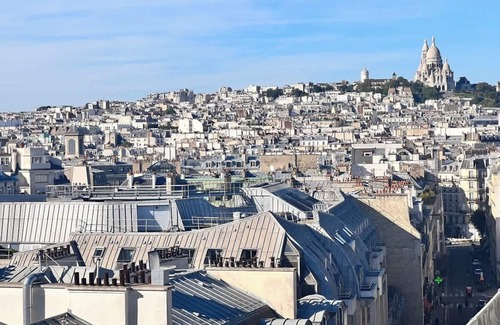 Quartier du Faubourg-Montmartre Apartment | Habitat Parisien -1BR-1BA with Parisian rooftop view