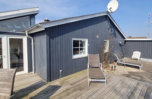 Diernæs Strandby House | Harmoniously renovated vacation home near the beach with a view of the water
