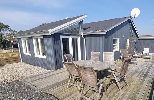Diernæs Strandby House | Harmoniously renovated vacation home near the beach with a view of the water