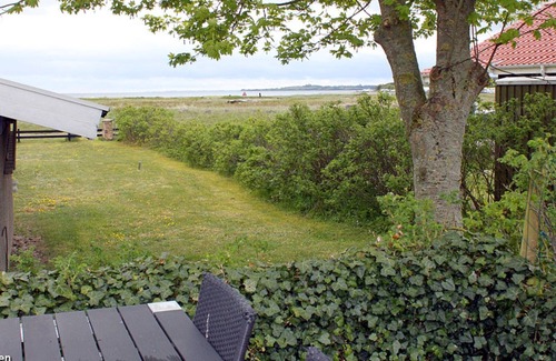 Diernæs Strandby House | Harmoniously renovated vacation home near the beach with a view of the water