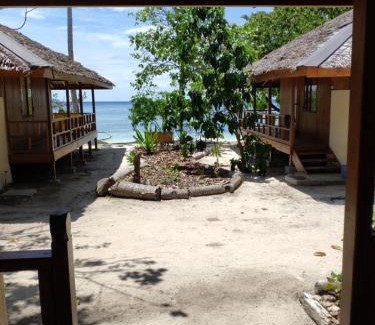 Pulau Kadidi Resort | Harmony Bay Resort and Dive Center
