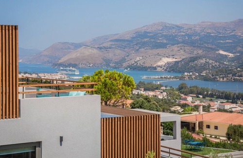 Khelmata Apartment | Harmony Suites SKY Queen suite with sea view