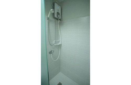 North Reclamation Area Condo | Heart of Cebu + fast wifi + Netflix