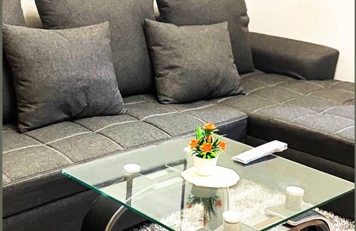 San Bartolome Condo | Heart of the city with the best staycation spot in town with pool access!