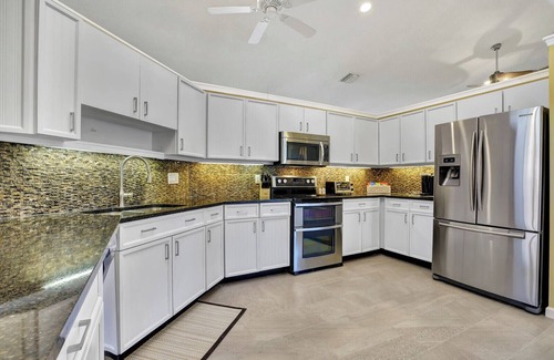 Wellington House | Heart of Wellington - Luxury Home with Heated Pool Pets welcomed