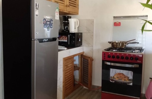 Ukunda House | Hellenas Gem, an African themed and tranquil one bedroom house in Diani