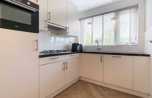 Groot Valkenisse House | Hello Zeeland - Vakantiewoning Beach Lodge Zilt