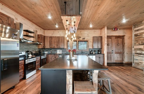 Sevierville Cabin | Hibernation Lodge | Indoor Pool, Arcade, Theater, Hot Tubs, Sleeps 48 Guests