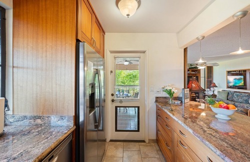 Kihei Condo | Hidden Gem: 1BD/2BA with Ocean Views Visible Through Lush Tropical Surroundings