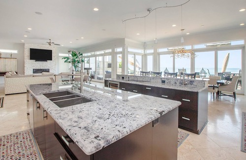 Grand Beach House | High-end lakefront home with poker table, infinity pool, pool table & WiFi
