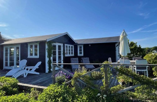 Hornslet House | High-lying home with a view of the sea and forest