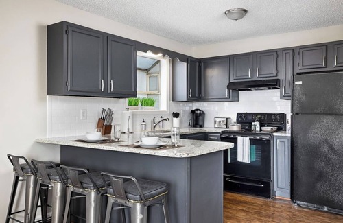 Five Points South Condo | Hilltop Getaway- Groups/6 units/King Beds/Parking