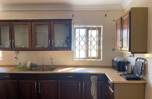Mallam House | Hilltop Grandeur: 8-Bedroom With Stunning Views of Accra and Pambros Waters
