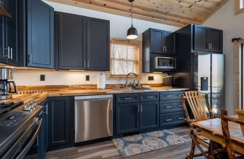 McHenry Cabin | Hilltop Hideaway, Sleeps 7, Hot tub, and fire pit!