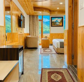 Sasaram Hotel | Himalayan River Resort, Manali- #riverside #private parking #scenic river & mountain view #open cafe # spacious room #big garden with campfire