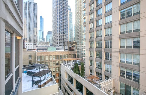Rush and Division Apartment | Hip River North 1BR w/Gym, W/D, near Magnificent Mile, by Blueground