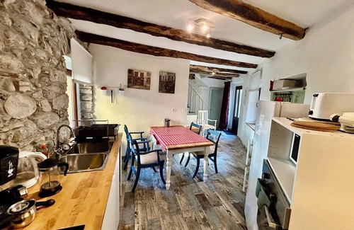 Tolmin House | Hisa Gradnikova 1850's stone cottage in the heart of Tolmin old centre