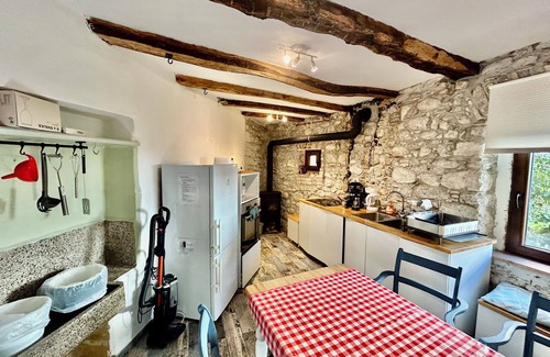 Tolmin House | Hisa Gradnikova 1850's stone cottage in the heart of Tolmin old centre