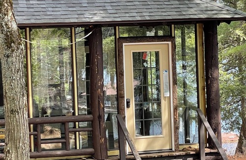 Long Lake Cabin | Historic 1908 “Great Camp” with private sandy beach, dock and WI-FI on Long Lake