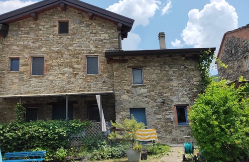 Valmozzola Villa | Historic 4BR stone house in the mountains with pool, 2 living rooms, new custom kitchen