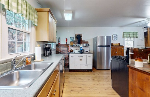 Sylva Cabin | Historic, private log cabin w/deck, fireplace & wood stove - one dog OK