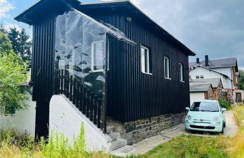 Thermalbad Wiesenbad House | Historic signal box of the Erzgebirge Railway with garden for a romantic vacation.