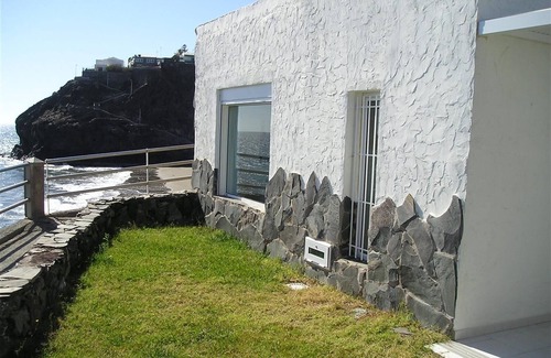 Playa del Aguila House | Holiday Home "Nueva Baviera 42" by the Sea with Garden & Shared Pool